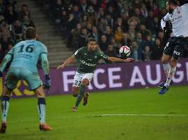 Kevin Monnet Paquet (c) s'apprête à reprendre le ballon contre Dijon. AFP