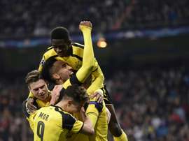 Borussia Dortmund players celebrating a goal. AFP