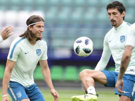 Savic (d) sigue lesionado. AFP