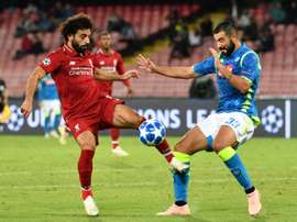 Napoli have announced Albiol (r) will not continue at the club. AFP