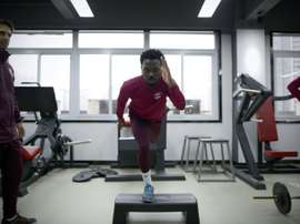 Fernandinho lors dune séance de musculation avec son équipe chinoise de Chongqing. AFP