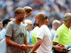 Avantage Jürgen dans le duel entre Klopp et Guardiola. AFP