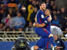 O duo da noite no Anoeta: Messi e Luis Suárez. AFP
