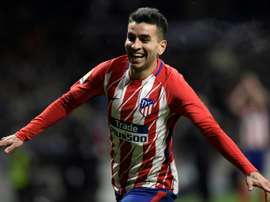 Angel Correa celebrates scoring the winning goal against Valencia. AFP