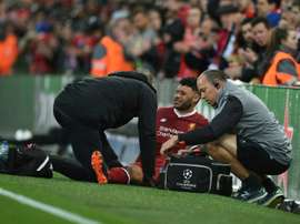 Alex Oxlade-Chamberlain, blessé lors du match face à la Roma. AFP