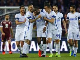 Geoffrey Kondogbia partage sa joie avec ses copéquipiers, après son but contre le Torino. AFP