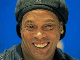 Ronaldinho voltará a Camp Nou em agosto. AFP