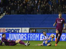 Will Grigg scored the winner. AFP