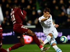Ligue 1: Marseille sacre le Paris SG, Toulouse et Nîmes sombrent. AFP