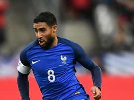 Nabil marque un but pour l'Équipe de France. AFP