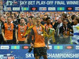 Les joueurs dHull City fêtent leur accession à la Premier League après leur victoire en barrages de Championship face à Sheffield Wednesday, le 28 mai 2016 à Wembley