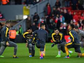 Les joueurs d'Arsenal à l'échauffement à Anfield, à Liverpool, le 4 mars 2017. AFP