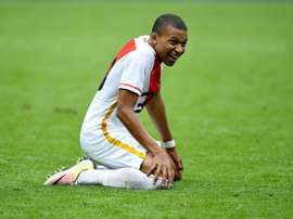 Kylian Mbappé sourit après avoir remporté avec Monaco la Coupe Gambardella (U19) face à Lens. AFP