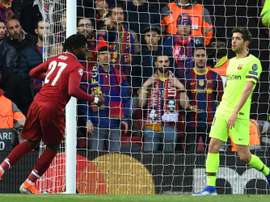 En Belgique, Origi est qualifié comme étant le grand héro de la Ligue des Champions. AFP