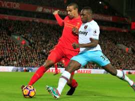 Le défenseur de Liverpool Joël Matip à la lutte avec le milieu de West Ham Michail Antonio. AFP