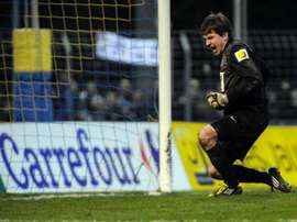 Olivier Robin exulte après avoir stoppé un penalty contre Lyon, en Coupe de France. AFP