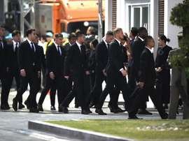 Les joueurs de Leicester arrivent au temple bouddhiste Wat Thepsirin. AFP