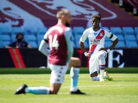 A boy has been arrested for racially abusing Zaha. AFP