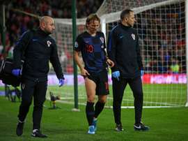 Modric souffre d'une contusion à la jambe droite. AFP