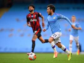 David Silva porte Manchester City. AFP