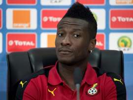 Le capitaine du Ghana Asamoah Gyan en conférence de presse lors de la CAN à Port-Gentil. AFP