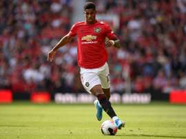 O United fica no quase contra o Liverpool. AFP