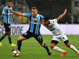 Arthur has sealed the move from Porto Alegre early. AFP