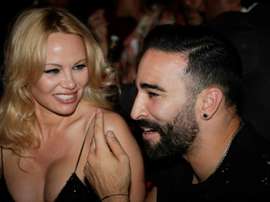 L'actrice américaine Pamela Anderson et le footballeur marseillais Adil Rami. AFP