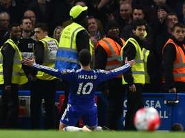 Hazard celebrates scoring against Tottenham last season. AFP