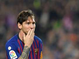 Ten Cate se rindió a los pies de Messi. AFP