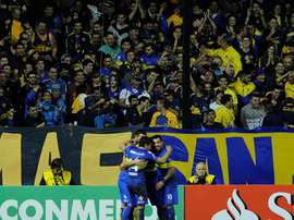 Carlos Tevez celebrates a goal for Boca Juniors against Deportivo Cali. EFE