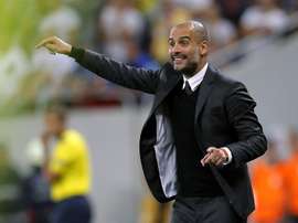 L'entraîneur Pep Guardiola lors du match aller des barrages de Ligue des champions à Bucarest. EFE
