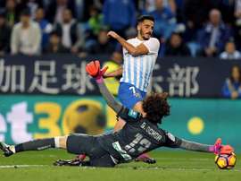 Una magnífica actuación de Ochoa, salvó un punto para el Granada en La Rosaleda. EFE/Archivo