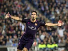 Luis Suárez posó junto a Santiago Melé. EFE/Archivo