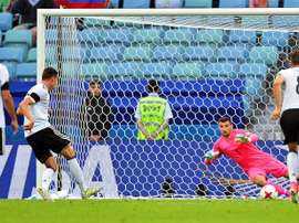 Ryan supports Postecoglou with Australia's back three under scrutiny. EFE