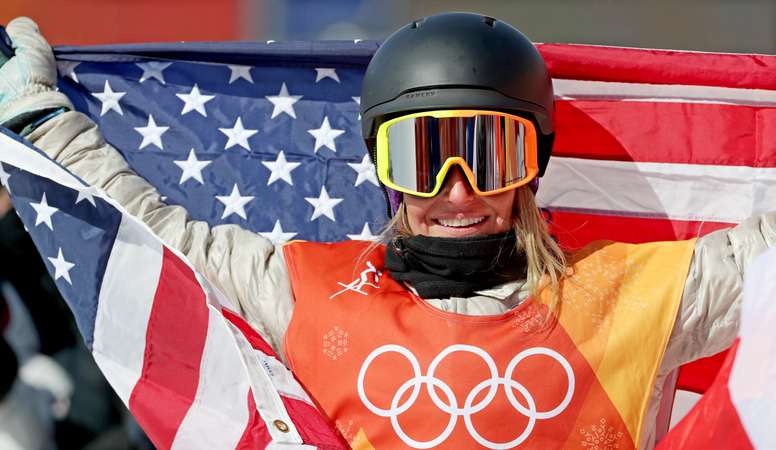 Gold medal winner Jamie Anderson of the USA celebrates her win with the US flag after the Womens Snowboard Slopestyle Final Run at the Bokwang Phoenix Park during the PyeongChang 2018 Olympic Games, South Korea, 12 February 2018. EFE
