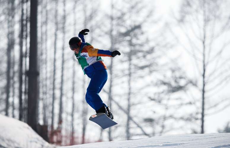 Fotografía facilitada por el COI que muestra a la española Astrid Fina Paredes en acción durante la prueba de snowboard cross celebrada en el centro Jeongseon durante los Juegos Paralímpicos de Invierno que se celebran en PyeongChang, Corea del Sur, hoy, 12 de marzo de 2018. EFE
