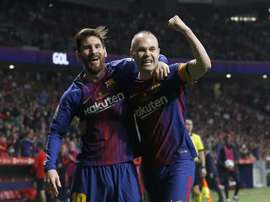 Messi égale Iniesta. AFP