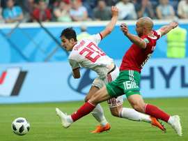 Sardar Azmoun will retire from international duty due to the effects on his family. AFP
