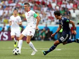 Lewandowski, sometido a un duro marcaje, estuvo desaparecido. EFE
