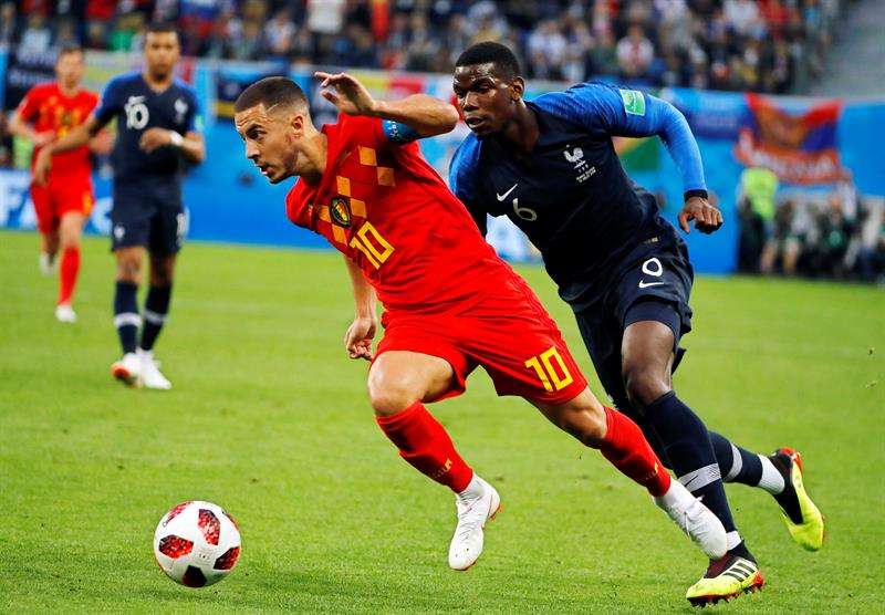 Hazard and pogba in action. photo credit: Besoccer