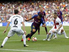 Luis Suarez in action for Barcelona against Huesca. AFP