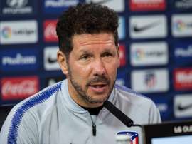 Simeone watched from the stands. AFP