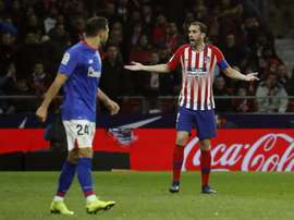 Godin adds to manager Simeone's central defensive woes. EFE