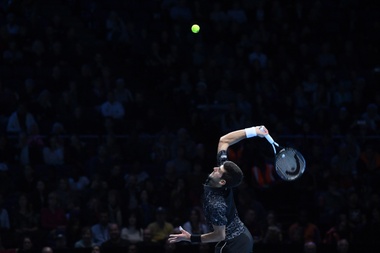El tenista sudafricano Kevin Anderson celebra tras vencer al japonés Kei Nishikori durante su encuentro perteneciente a las Nitto Finales ATP disputado en Londres, Reino Unido. EFE