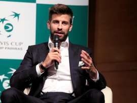 Vilanova con Pique. AFP