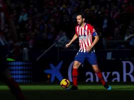 Felicitaciones a Godín. EFE/Archivo