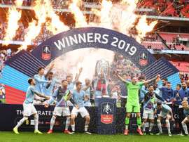 Premiação espetacular para o Manchester City pela tríplice coroa. EFE/EPA