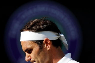El suizo Roger Federer tras lograr la duodécima final de Wimbledon y la 31 en un Grand Slam al vencer al español Rafael Nadal en Londres, Gran Bretaña. EFE/Adrián Dennis