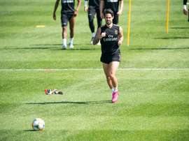 Isco completó parte de la sesión con el grupo. EFE